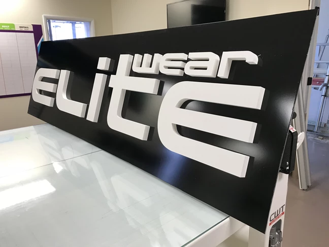1 thick dimensional PVC Storefront Sign for Elite Wear in Indianapolis,IN