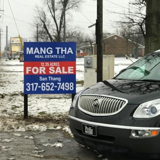Post and Panel Sign for Mang Tha Real Estate in Indianapolis IN